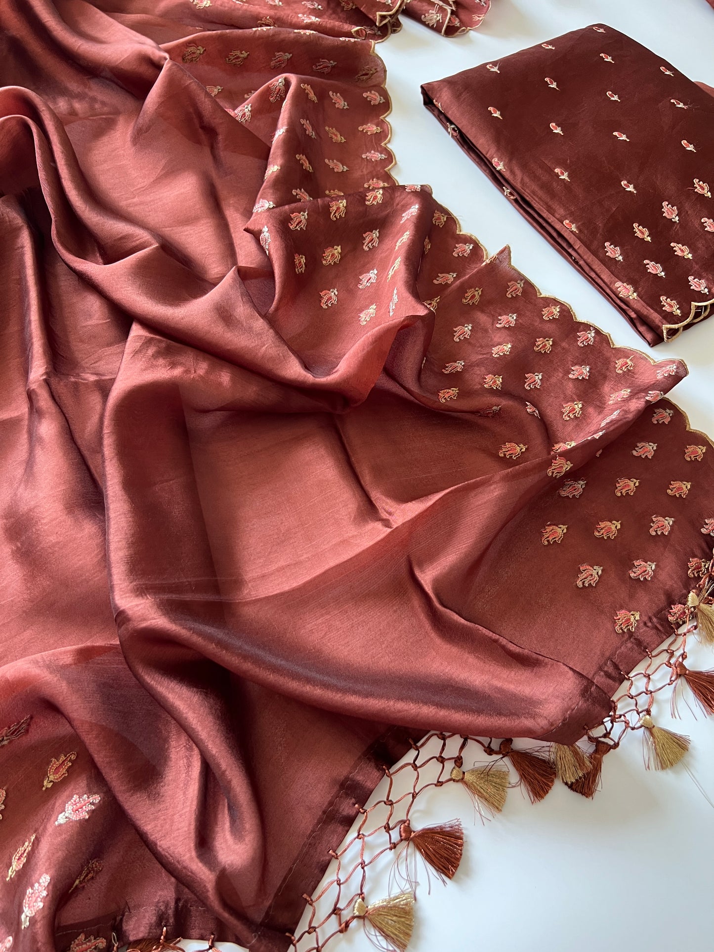 Brown Raw Mango handloom embroidered unstitched suit.