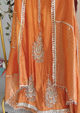 Orange Designer Partywear shimmer tissue unstitched suit.
