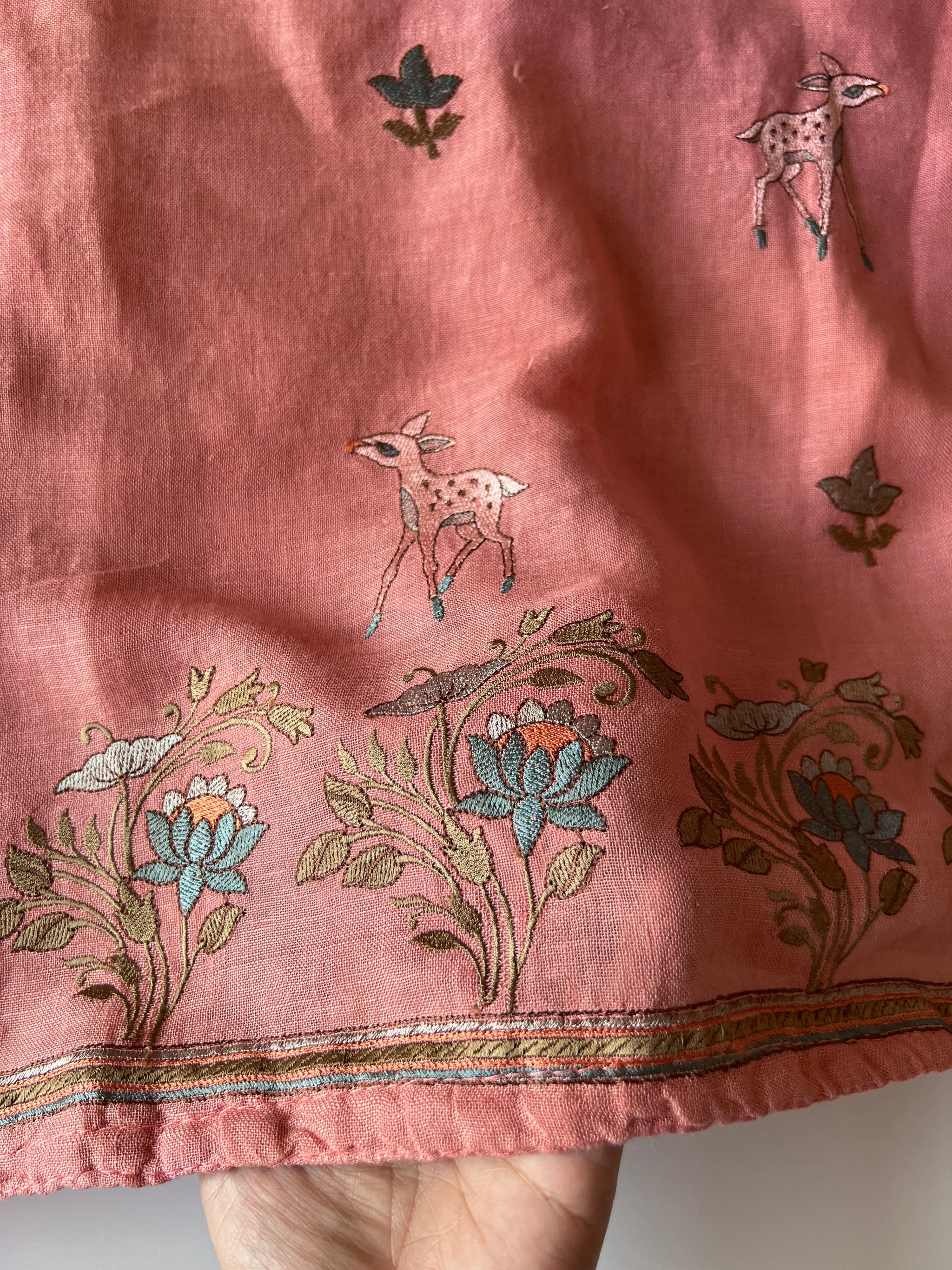 Pure linen Shikargah embroidered unstitched suit.