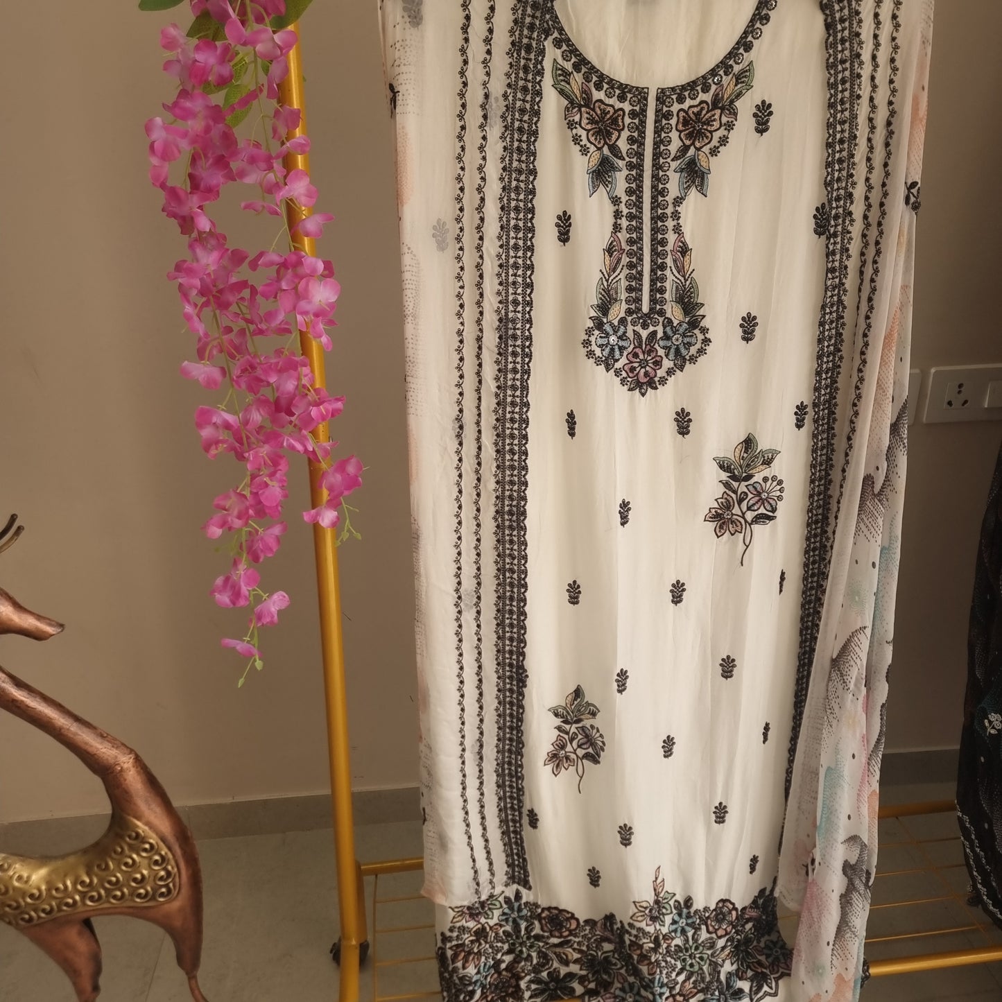 Opada Silk white with multi color thread work.