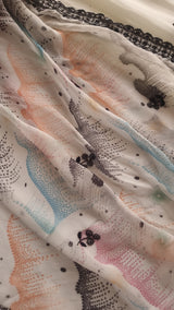 Opada Silk white with multi color thread work.