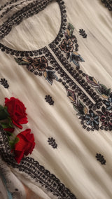 Opada Silk white with multi color thread work.