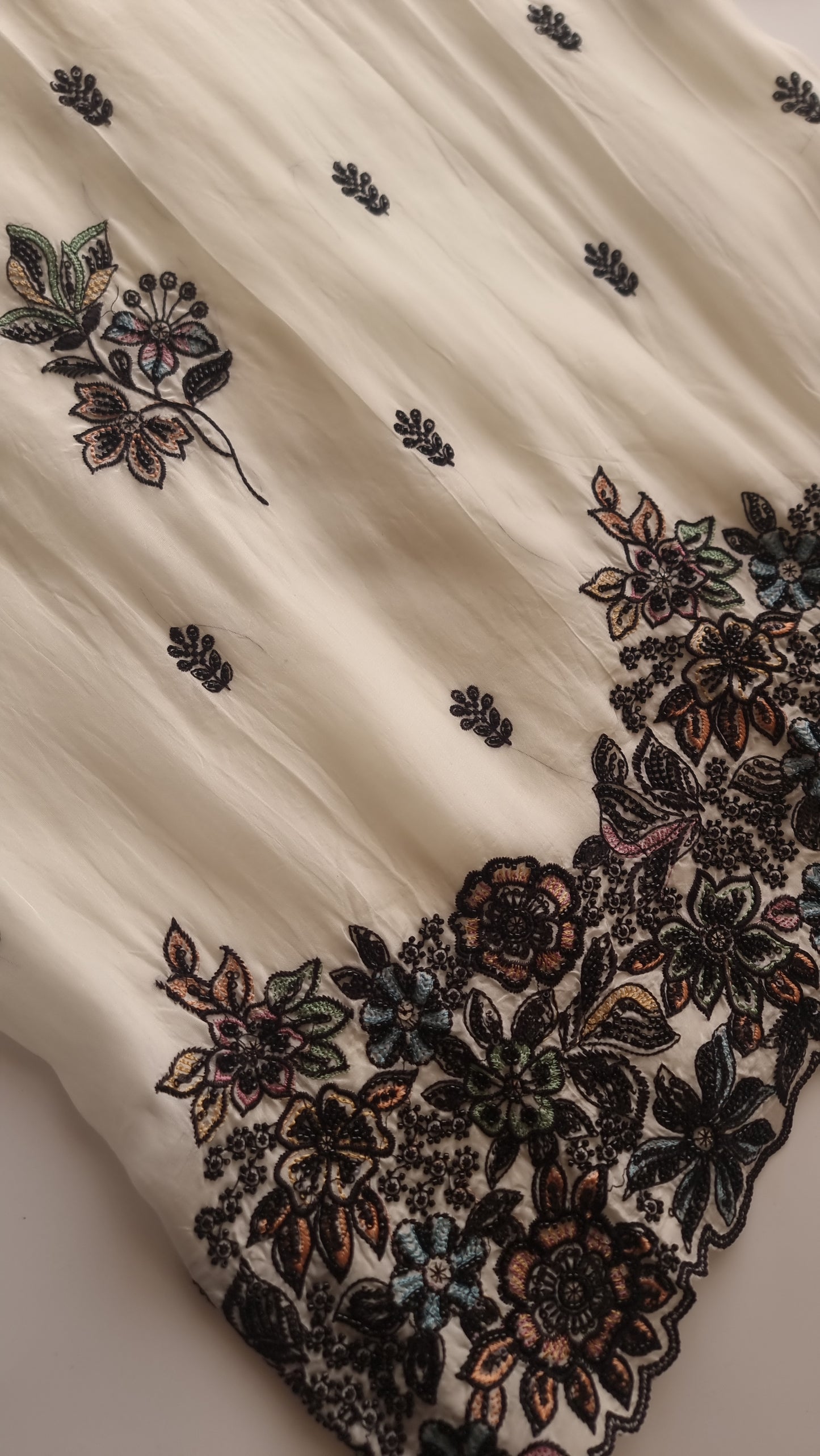 Opada Silk white with multi color thread work.