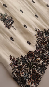 Opada Silk white with multi color thread work.