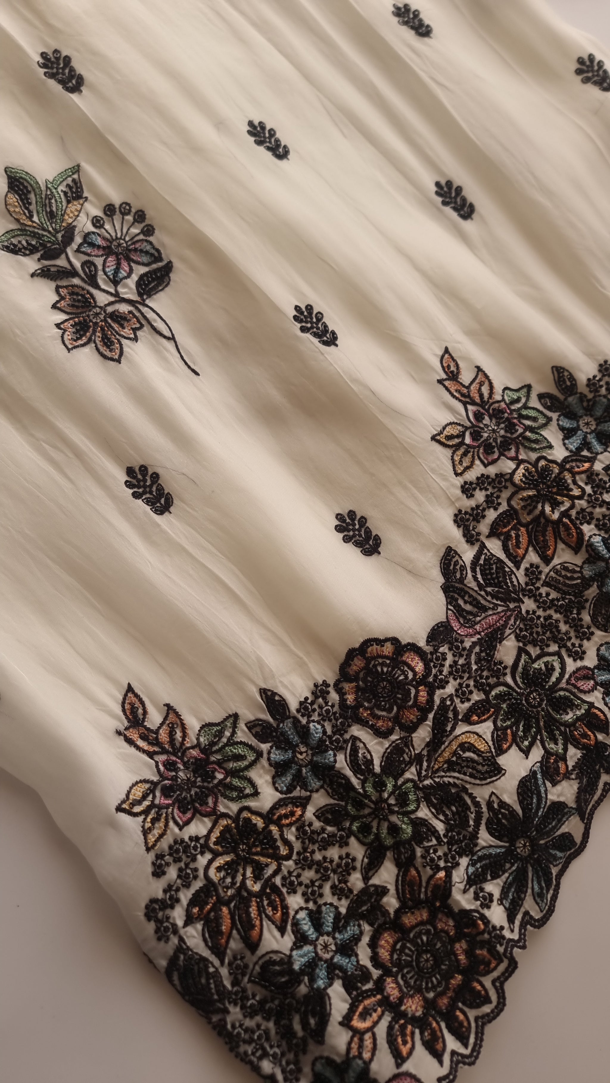 Opada Silk white with multi color thread work.