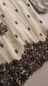 Opada Silk white with multi color thread work.