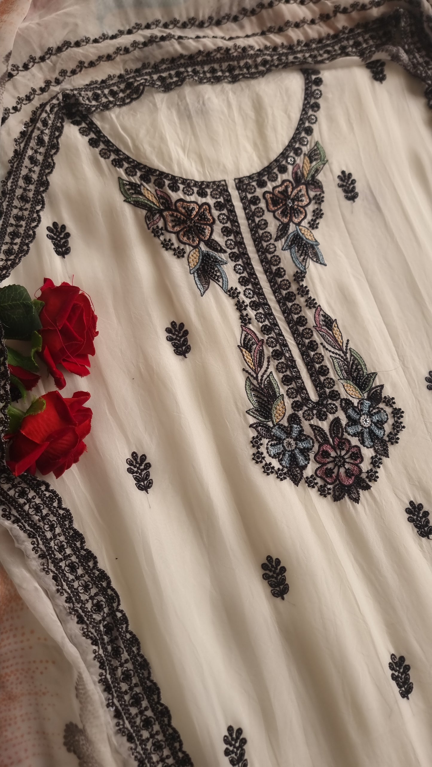 Opada Silk white with multi color thread work.