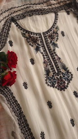 Opada Silk white with multi color thread work.