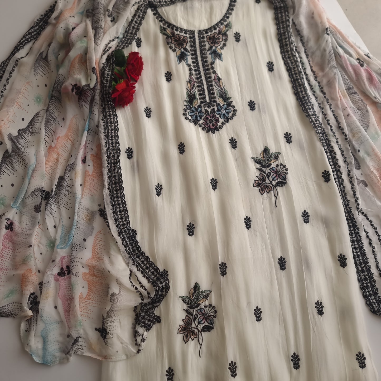 Opada Silk white with multi color thread work.