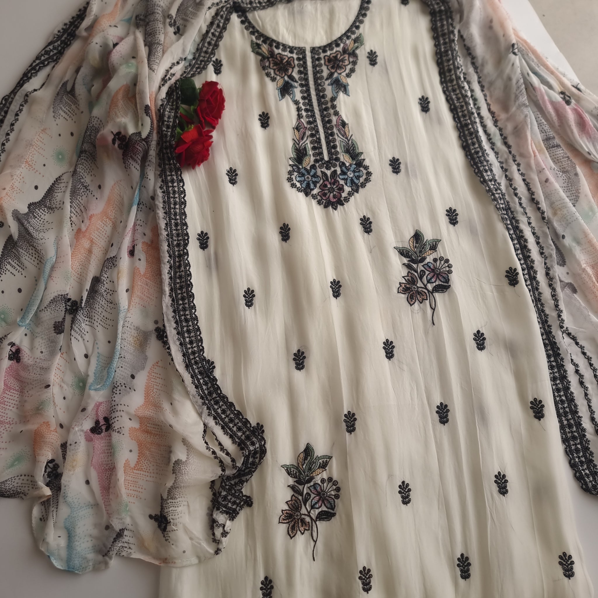 Opada Silk white with multi color thread work.