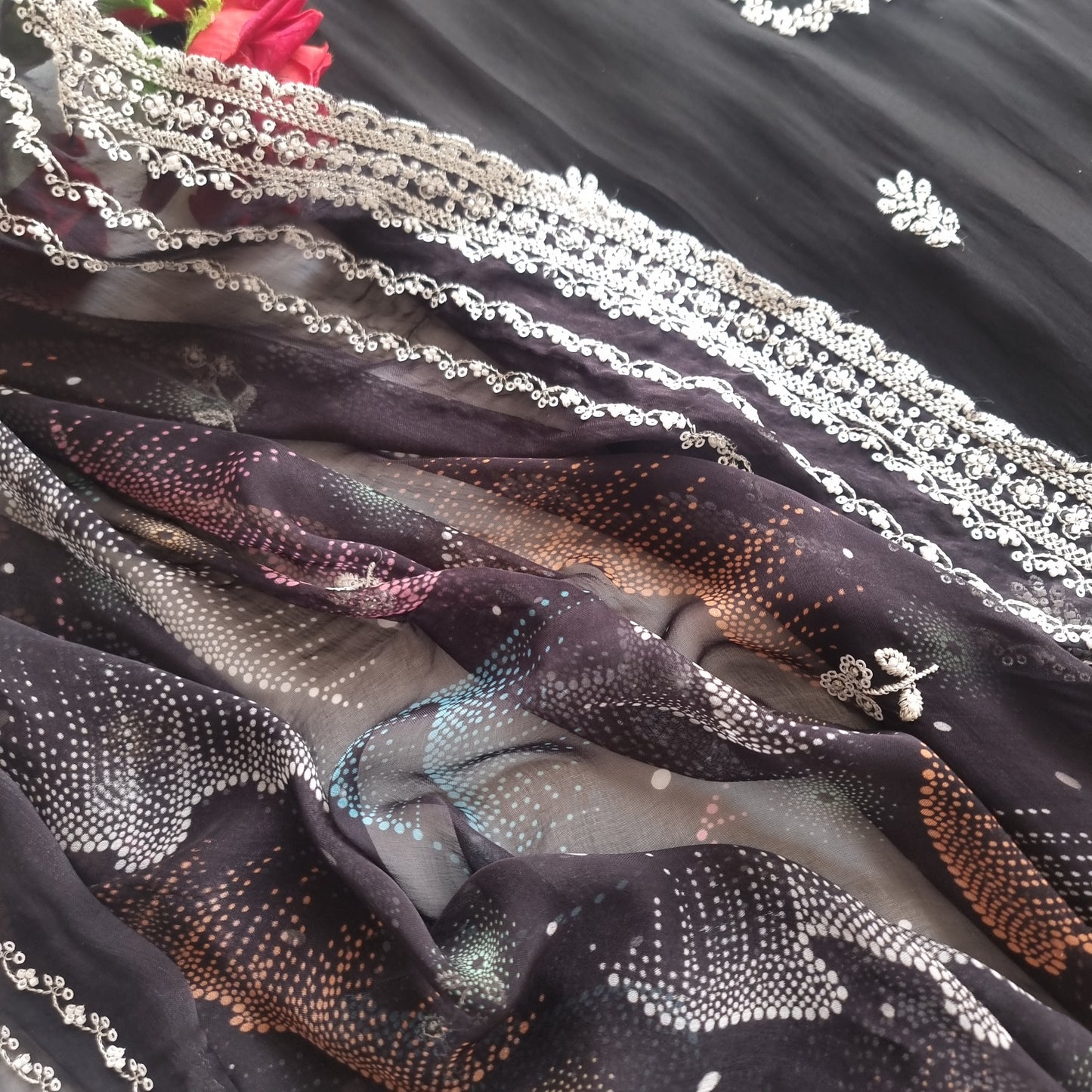 Black Opada Silk with multi color thread work.