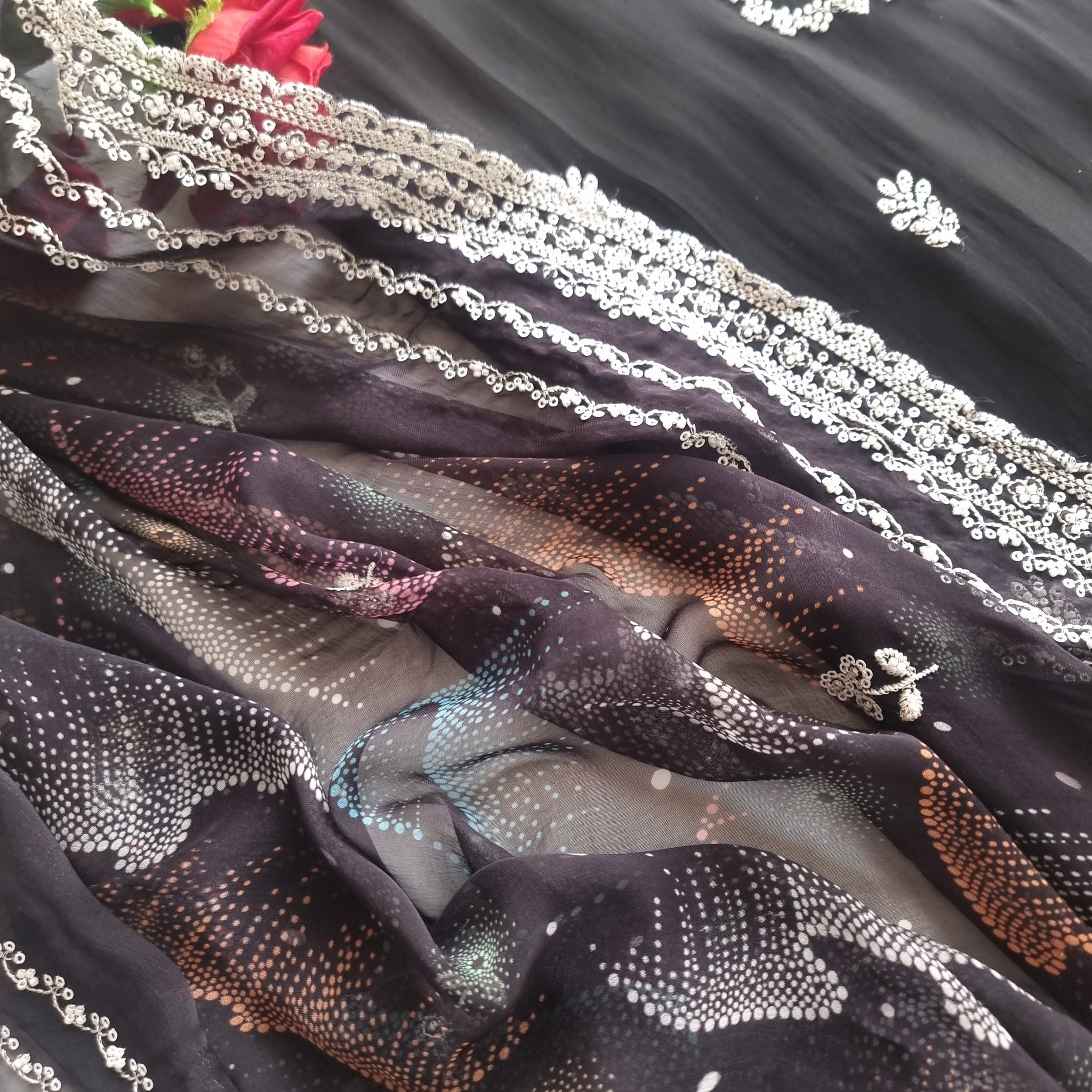 Black Opada Silk with multi color thread work.