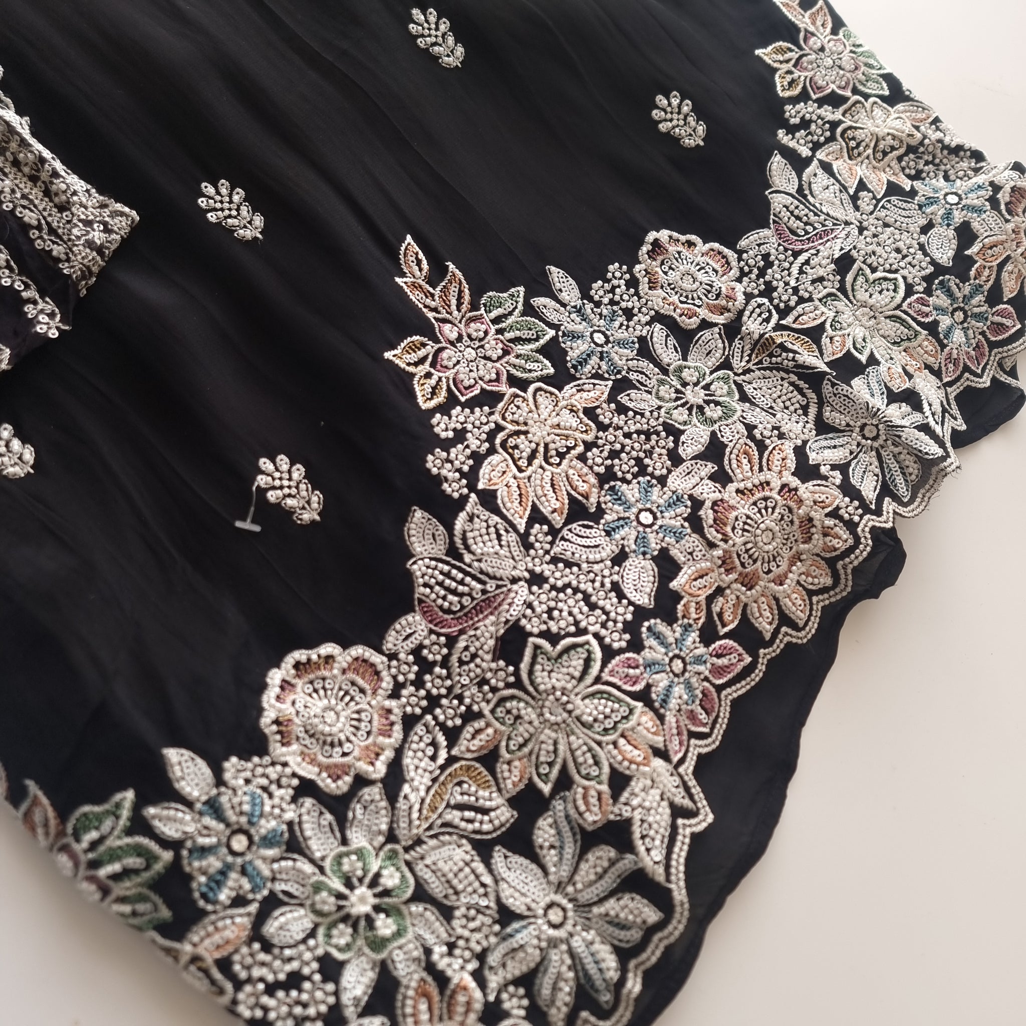 Black Opada Silk with multi color thread work.