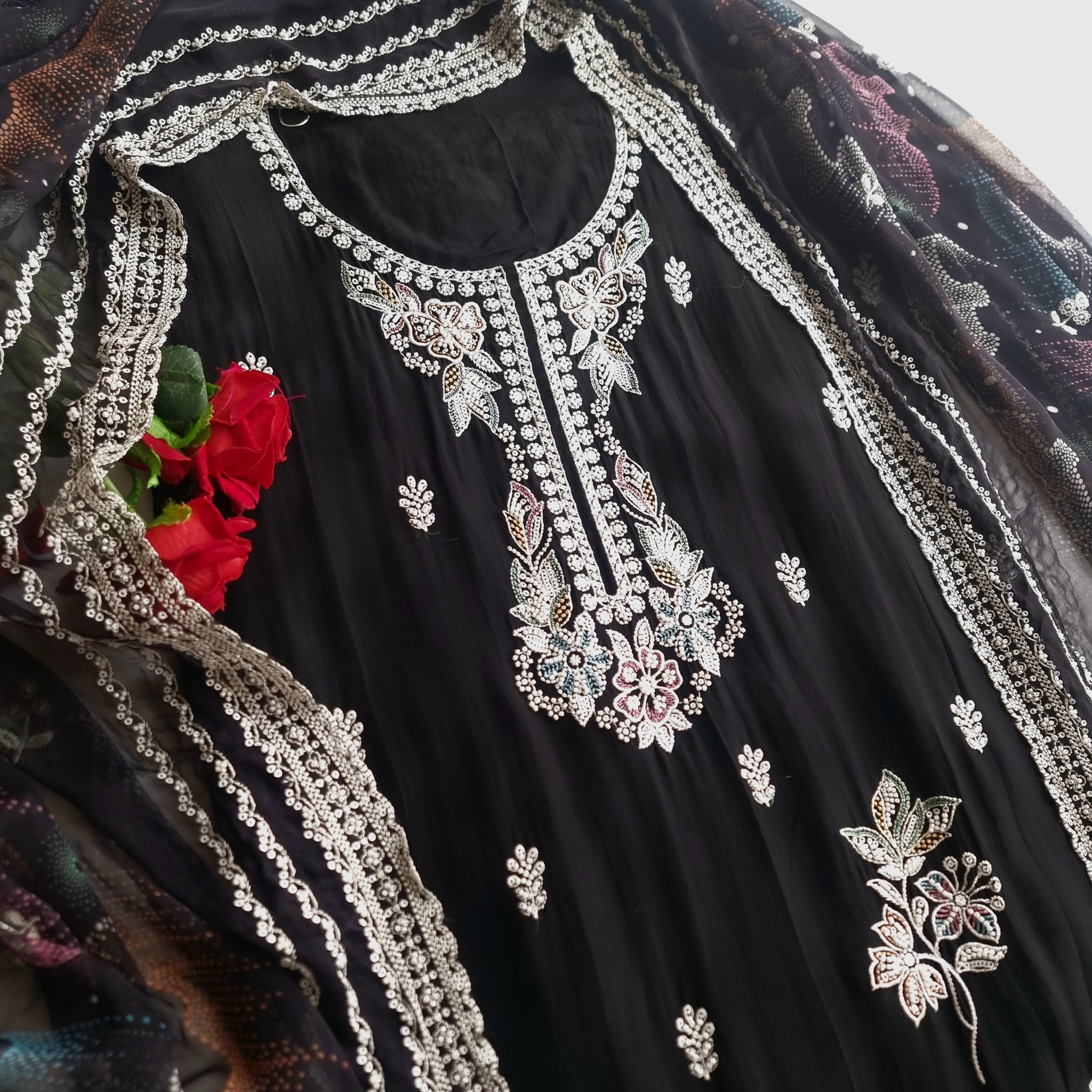 Black Opada Silk with multi color thread work.