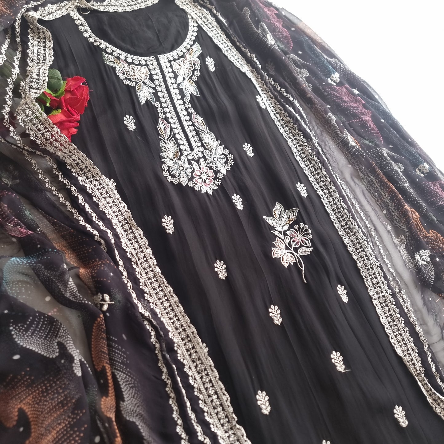 Black Opada Silk with multi color thread work.