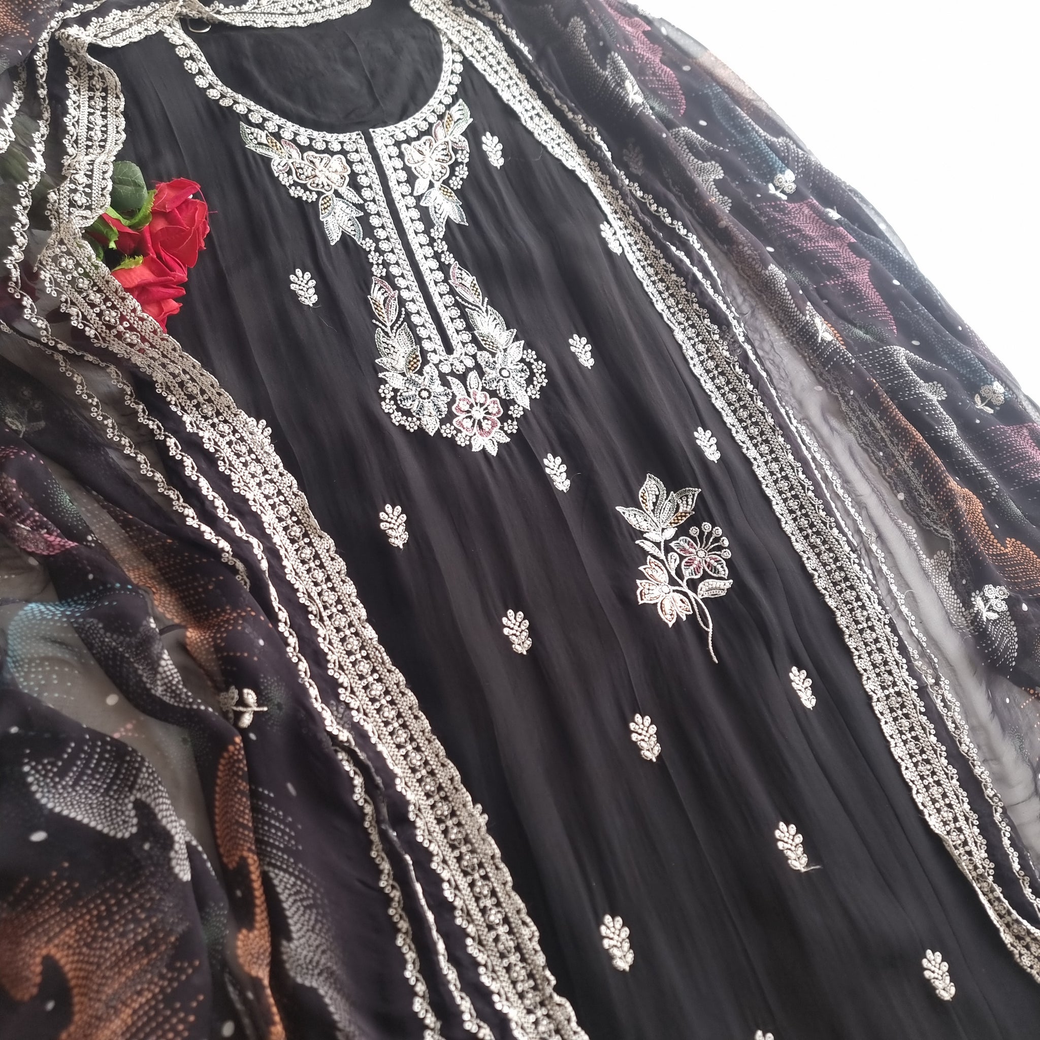 Black Opada Silk with multi color thread work.