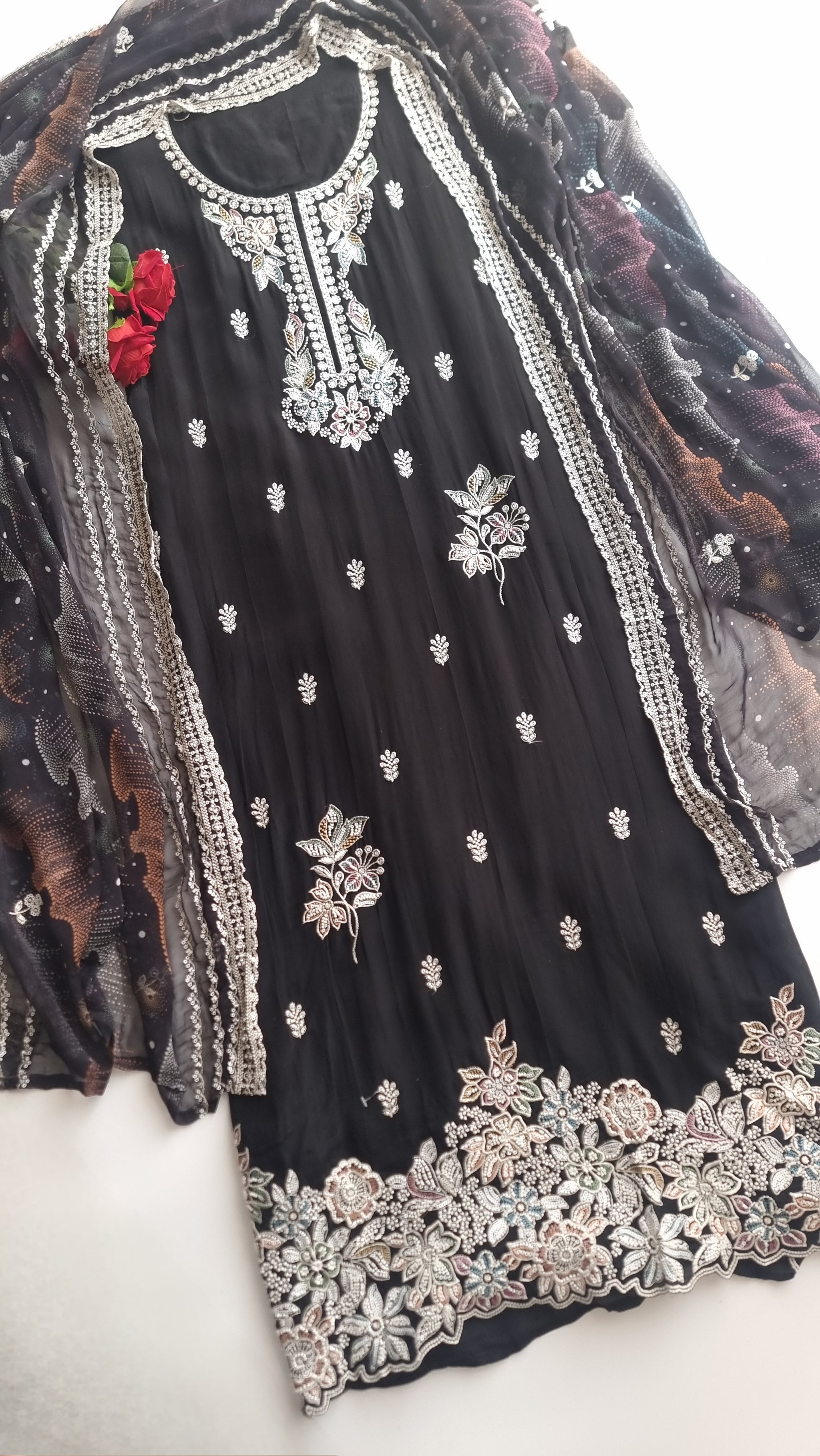 Black Opada Silk with multi color thread work.