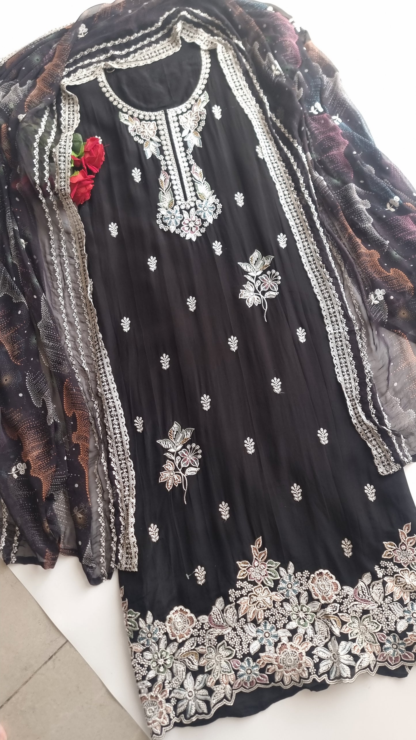 Black Opada Silk with multi color thread work.