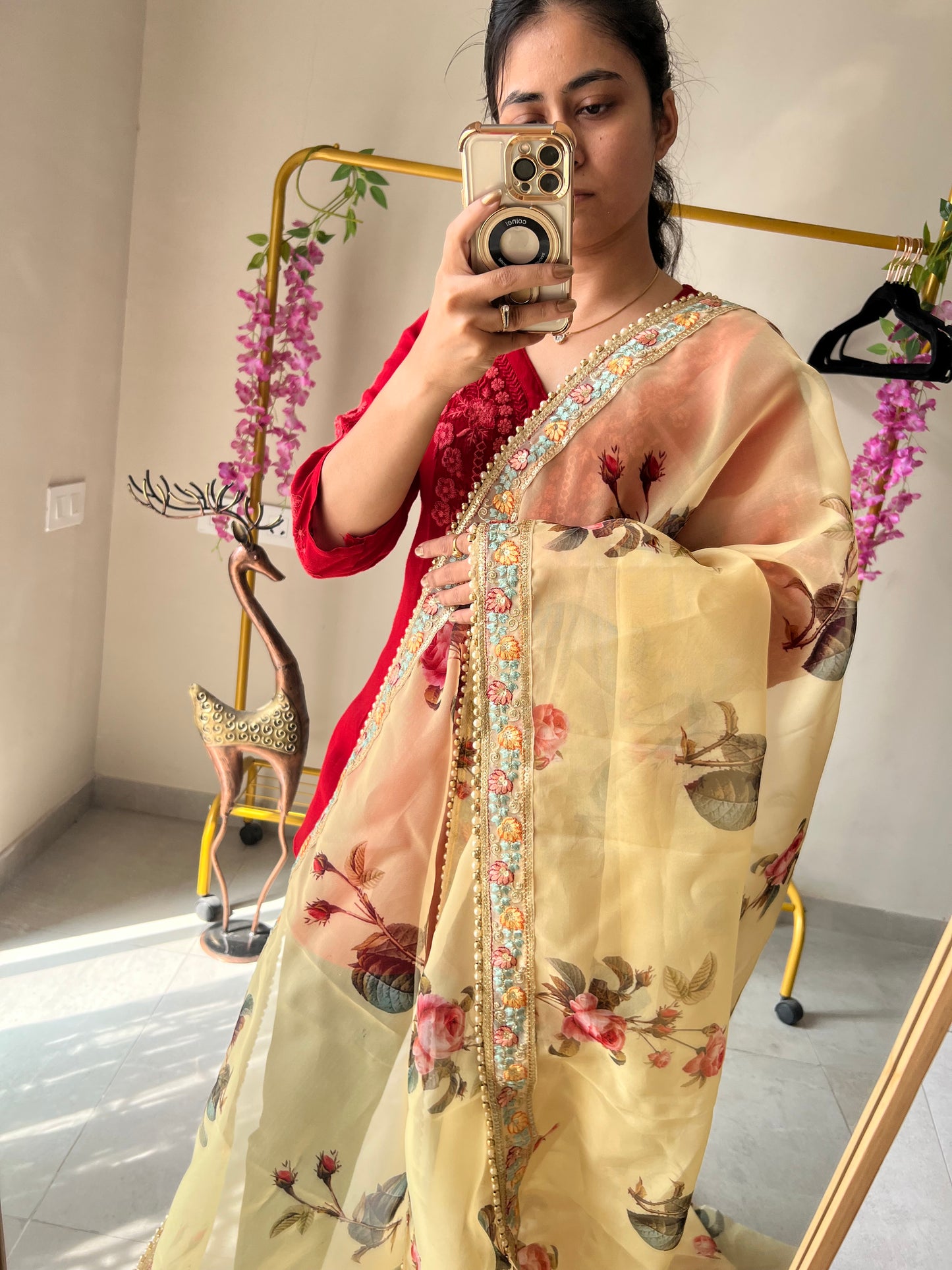 Floral Organza Saree with floral and beaded border.