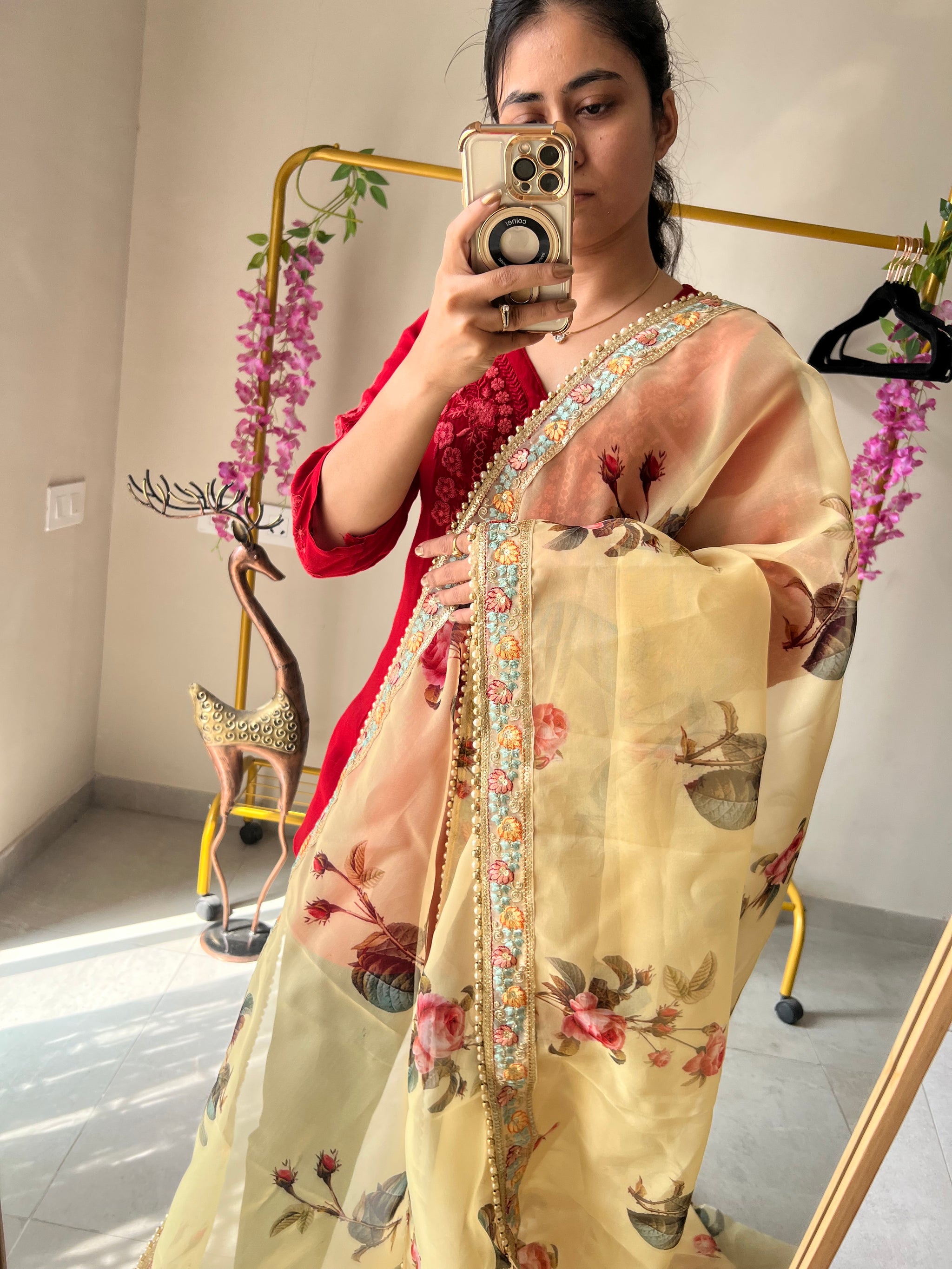 Floral Organza Saree with floral and beaded border.