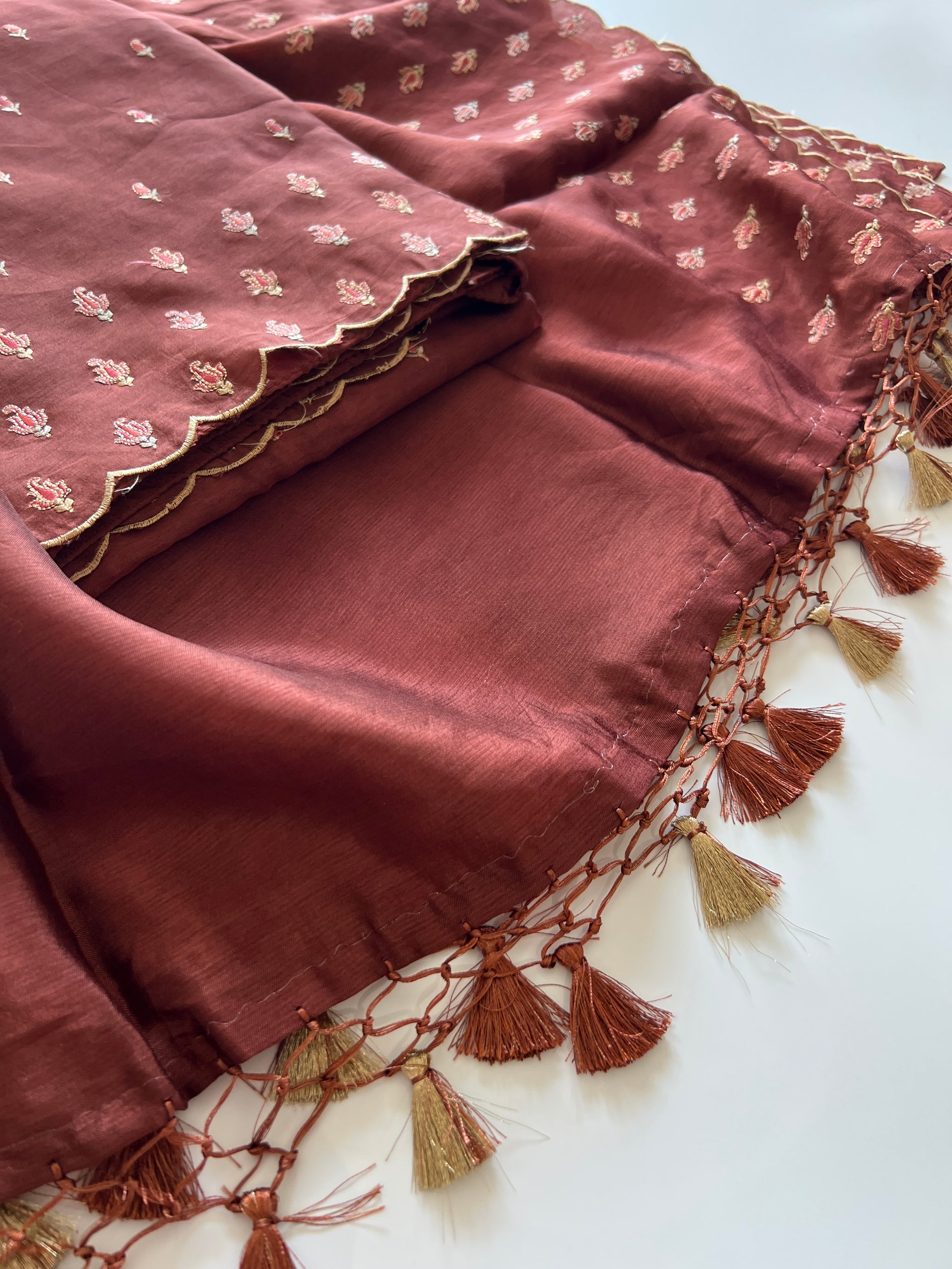 Brown Raw Mango handloom embroidered unstitched suit.