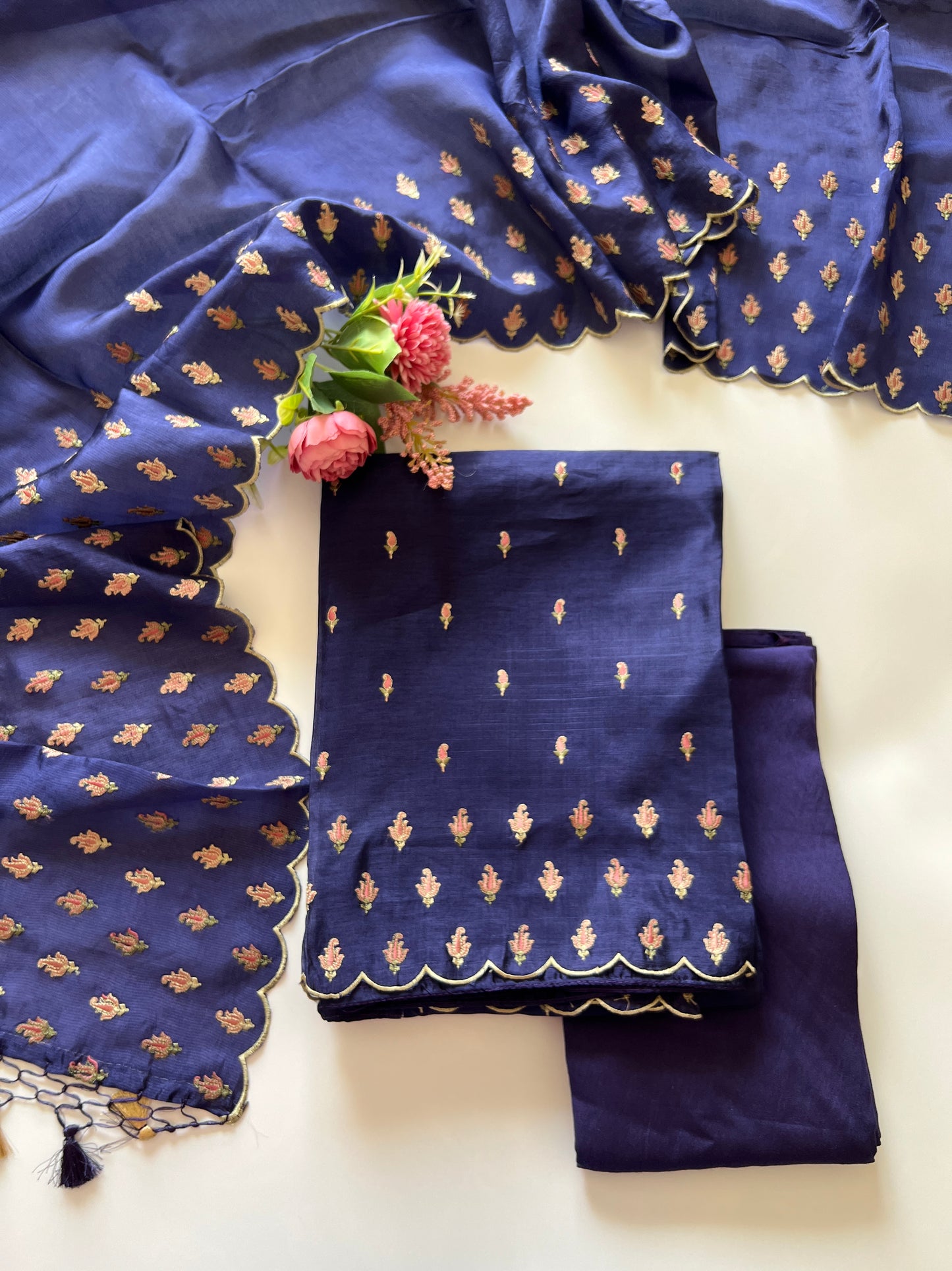 Blue Raw Mango handloom embroidered unstitched suit.