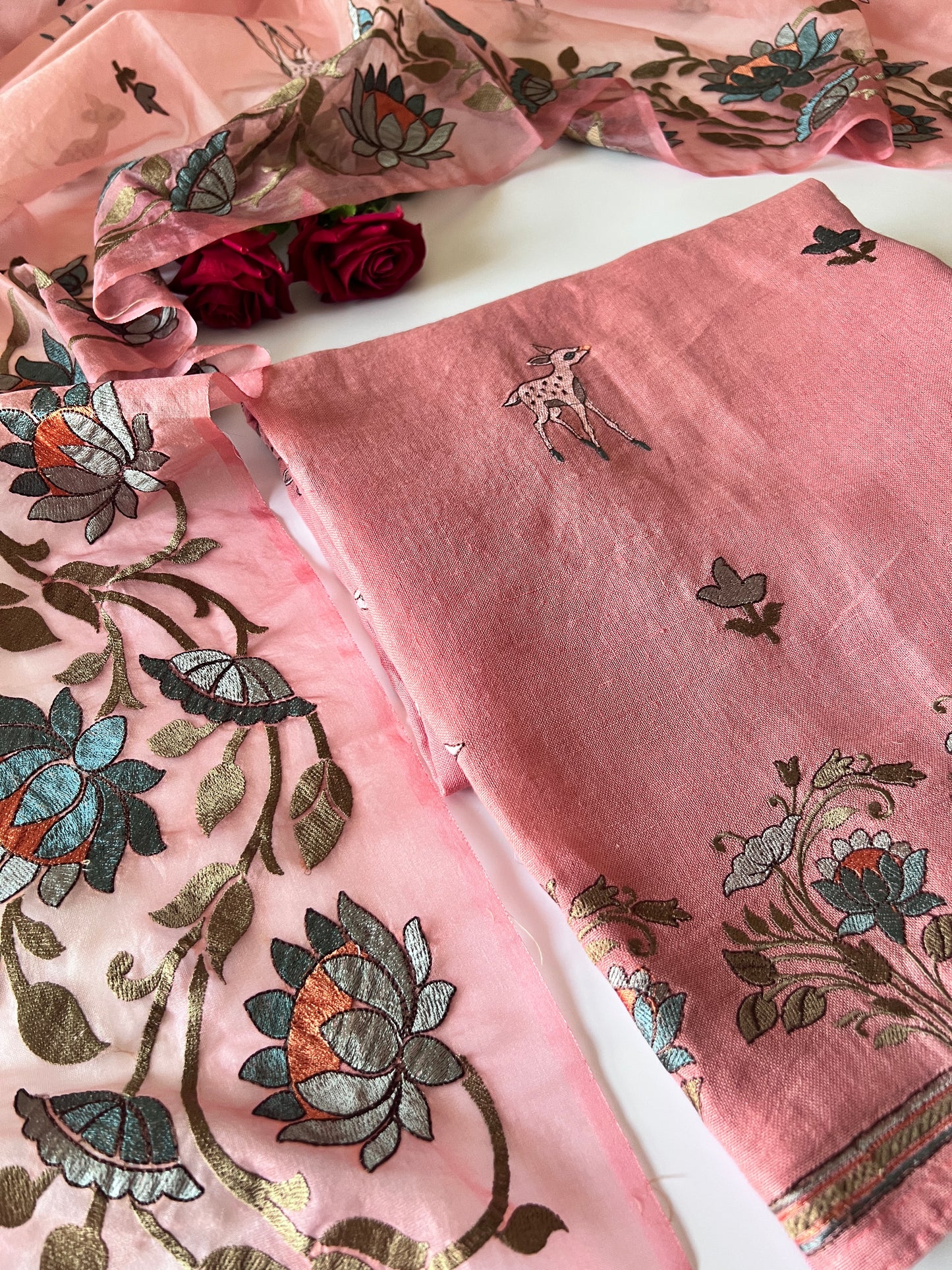 Pure linen Shikargah embroidered unstitched suit.