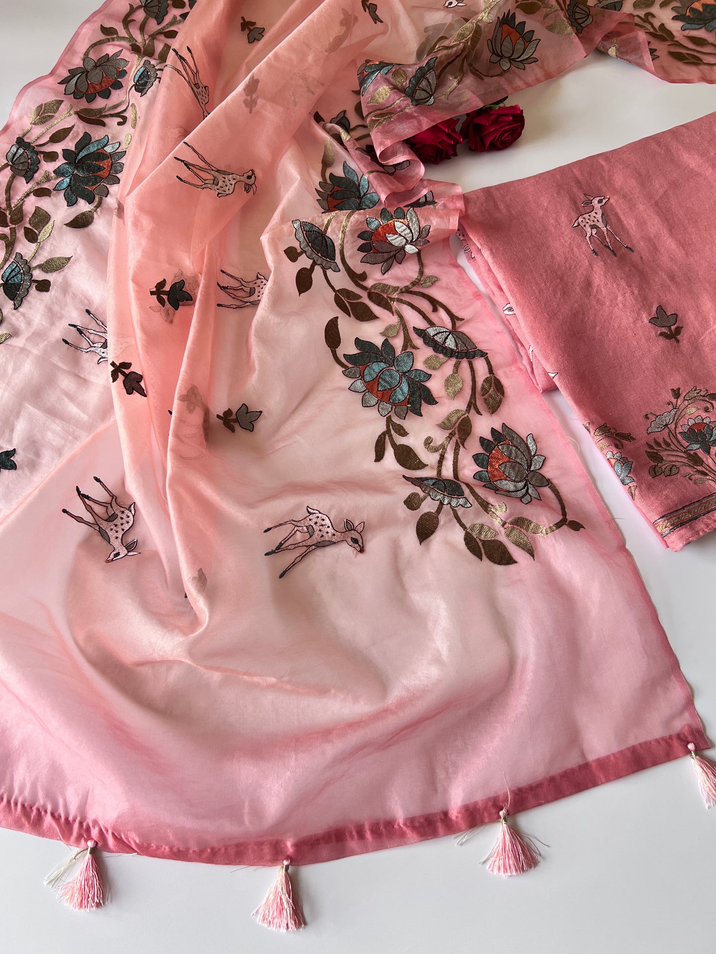 Pure linen Shikargah embroidered unstitched suit.