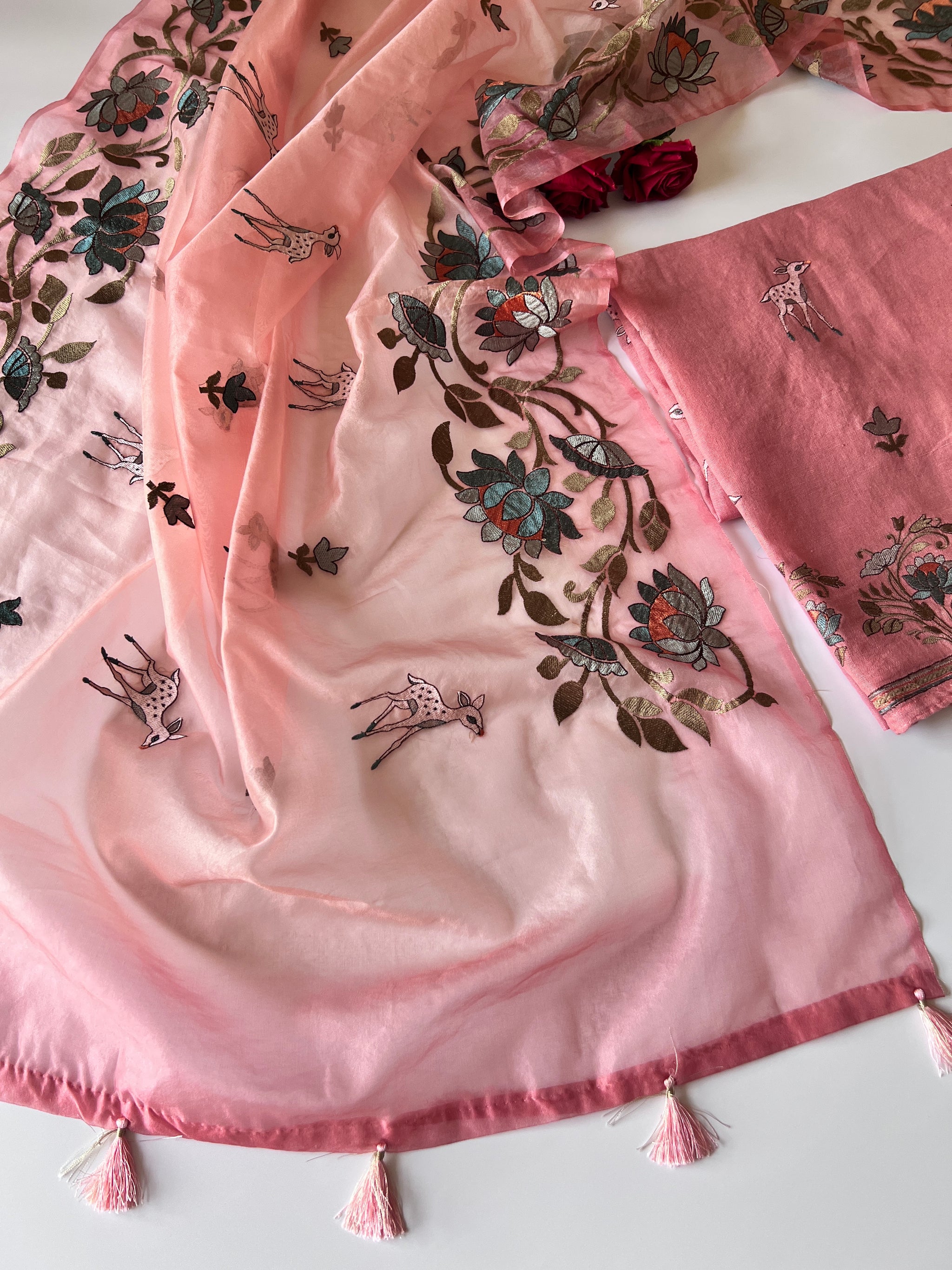 Pure linen Shikargah embroidered unstitched suit.