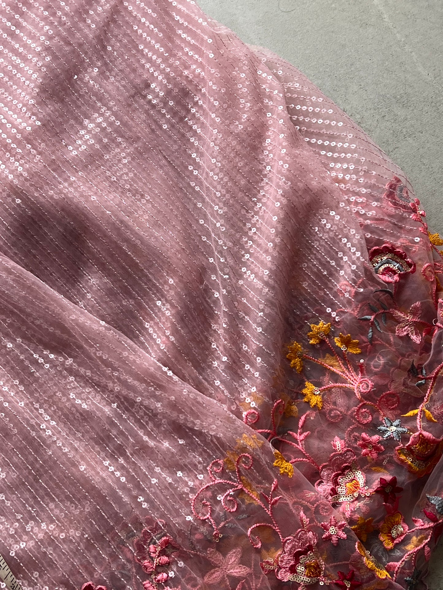 Net embroidered fabric for lehengas, kurtas.