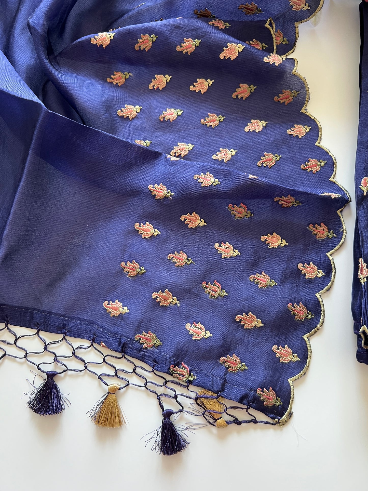 Blue Raw Mango handloom embroidered unstitched suit.