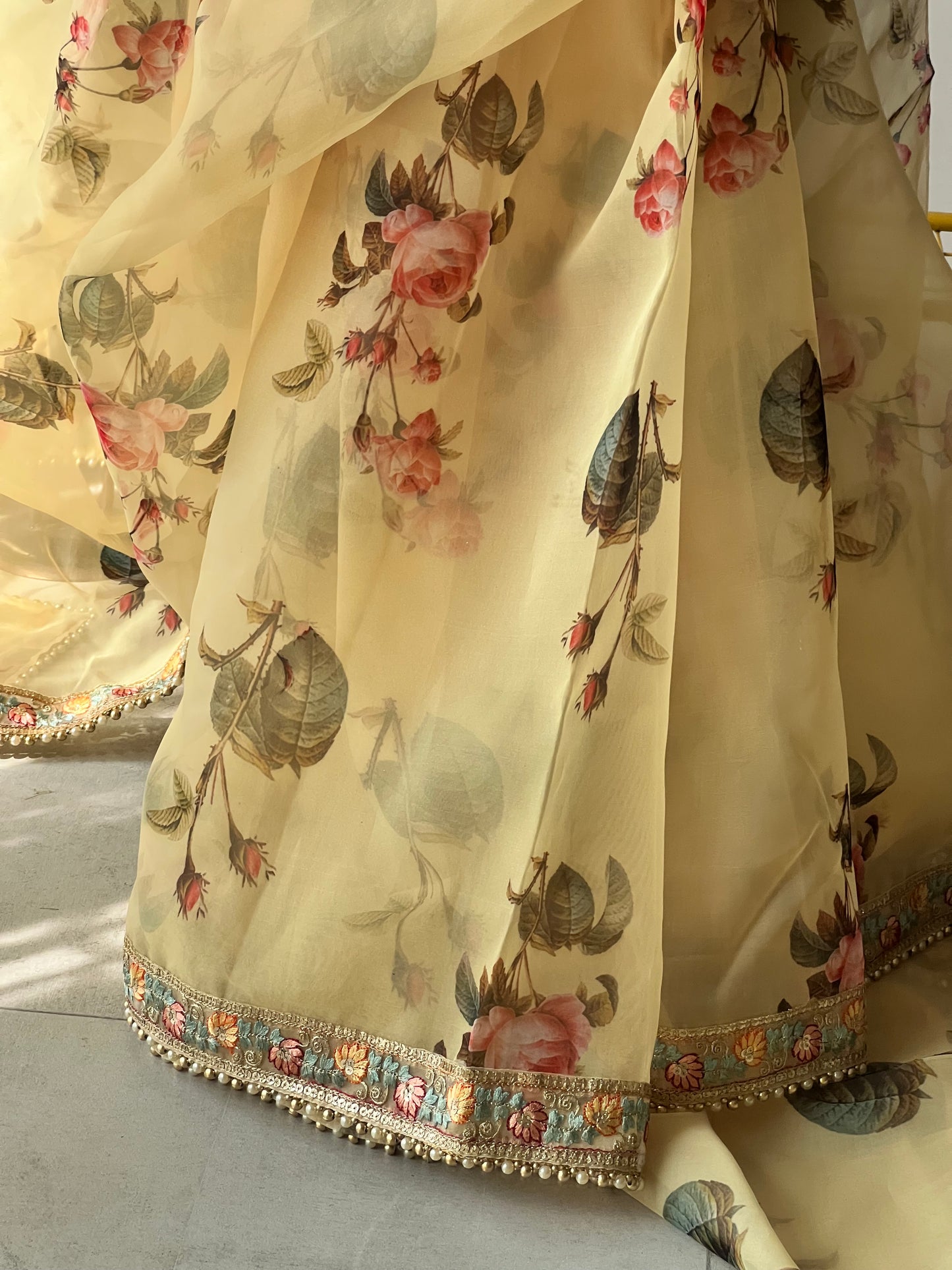 Floral Organza Saree with floral and beaded border.