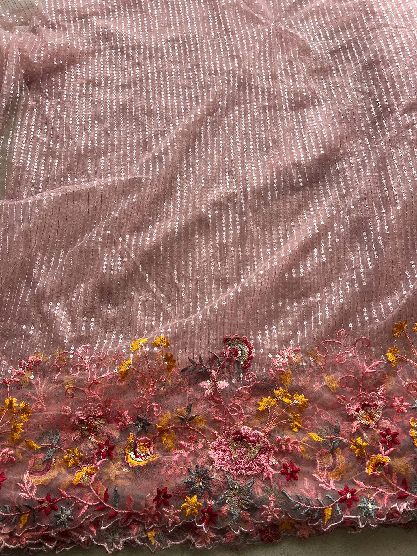 Net embroidered fabric for lehengas, kurtas.