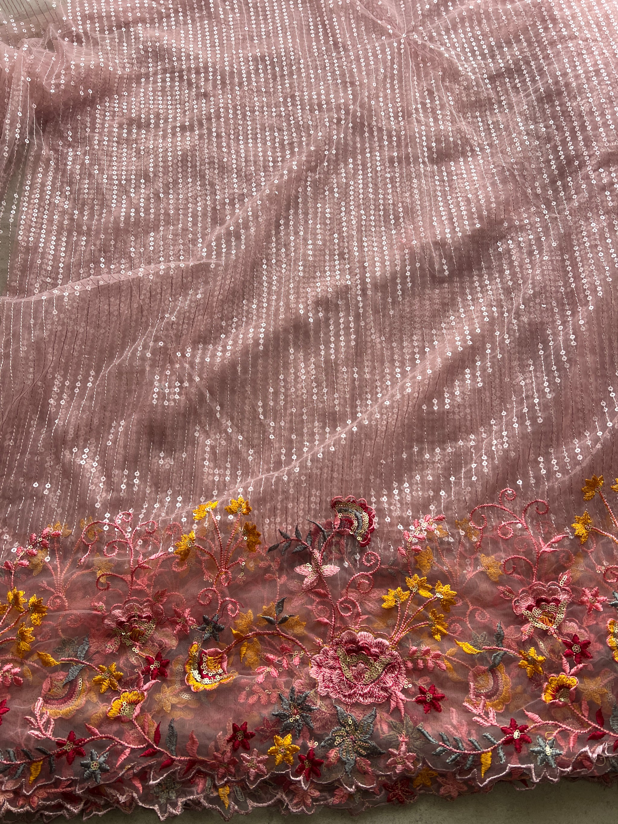 Net embroidered fabric for lehengas, kurtas.