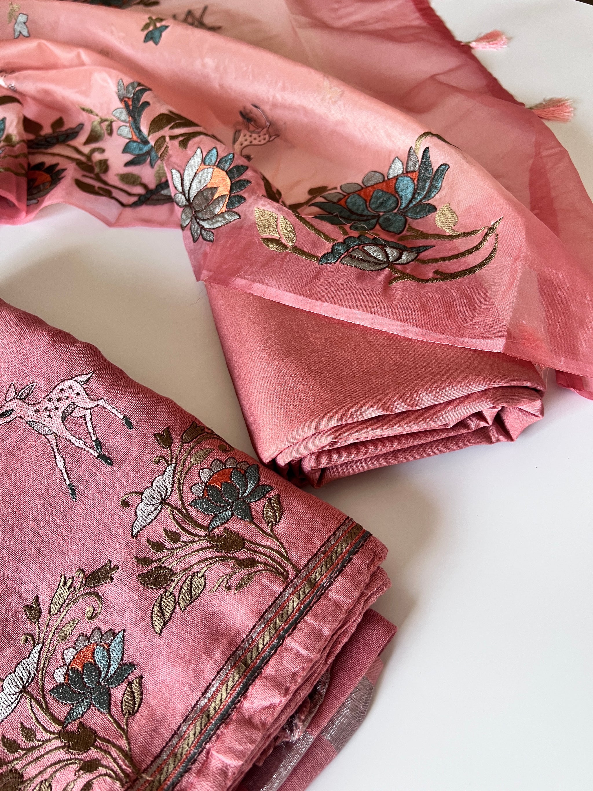 Pure linen Shikargah embroidered unstitched suit.