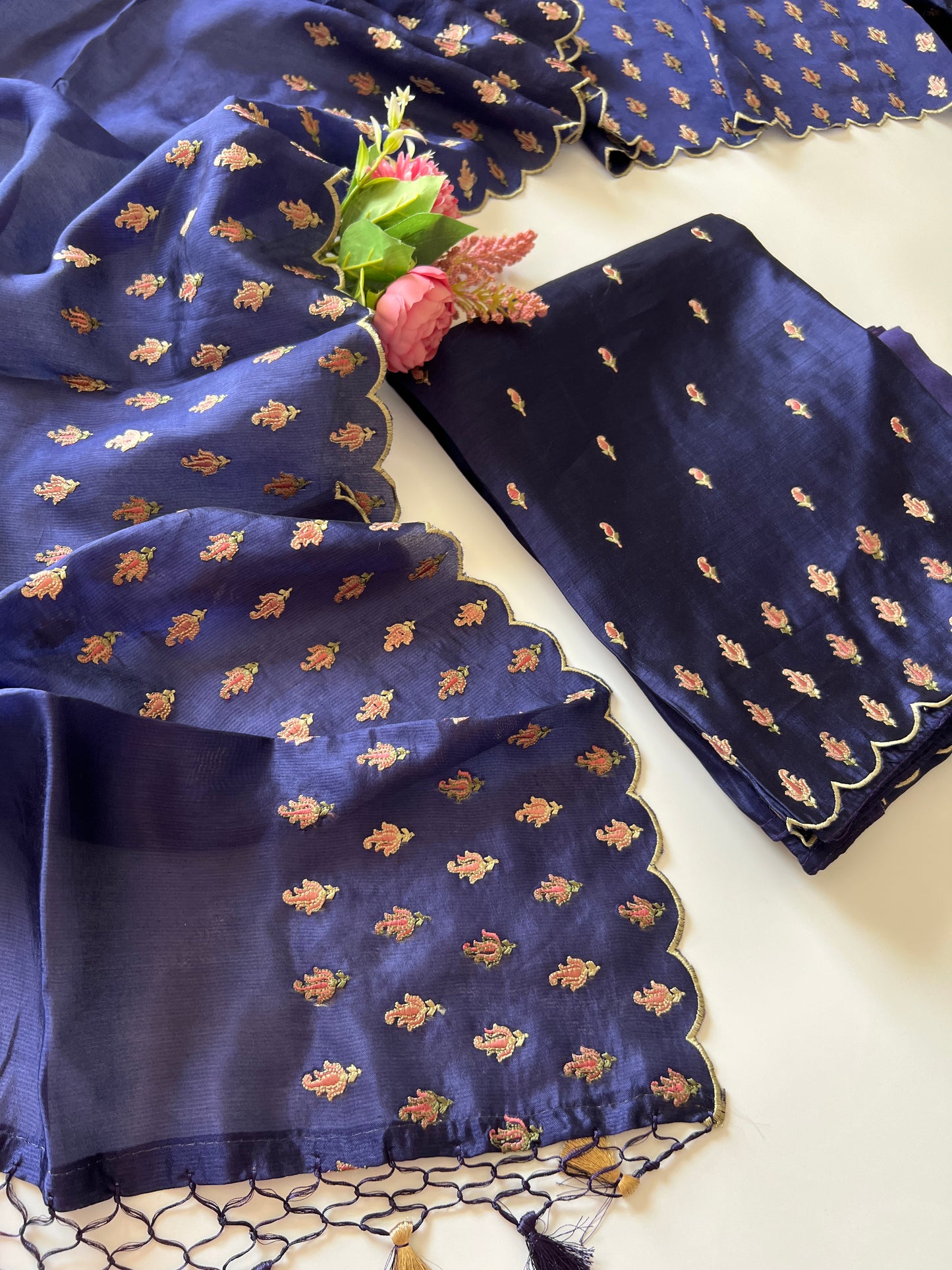 Blue Raw Mango handloom embroidered unstitched suit.
