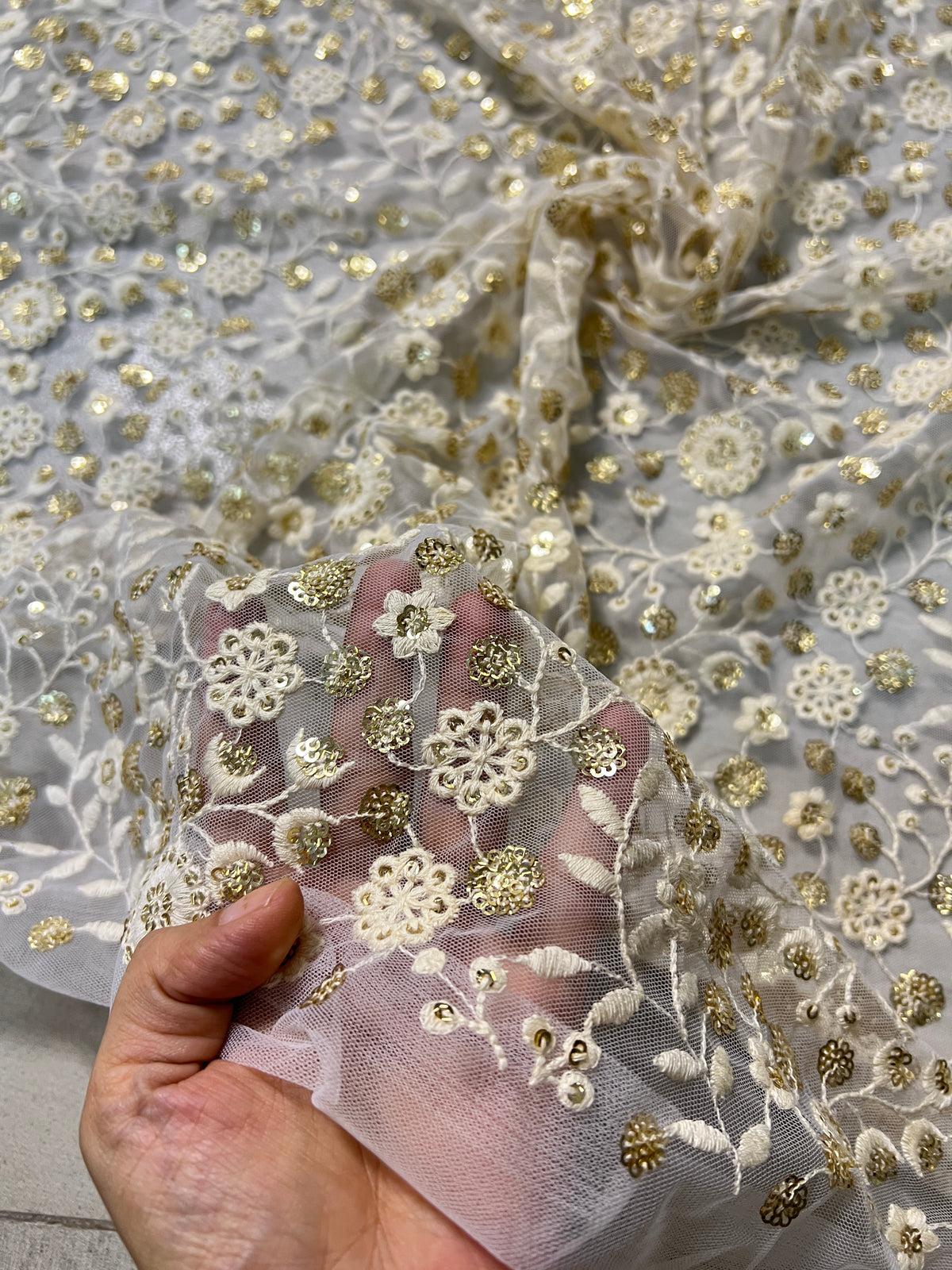 Dyeable net sequin flower embroidered fabric for lehengas, kurtas.