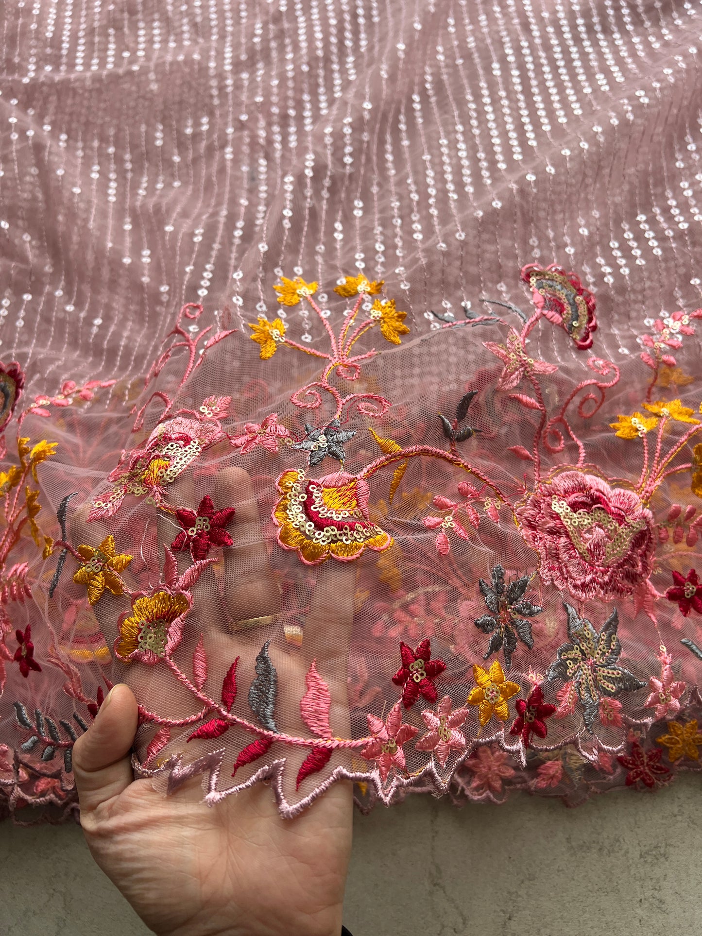 Net embroidered fabric for lehengas, kurtas.