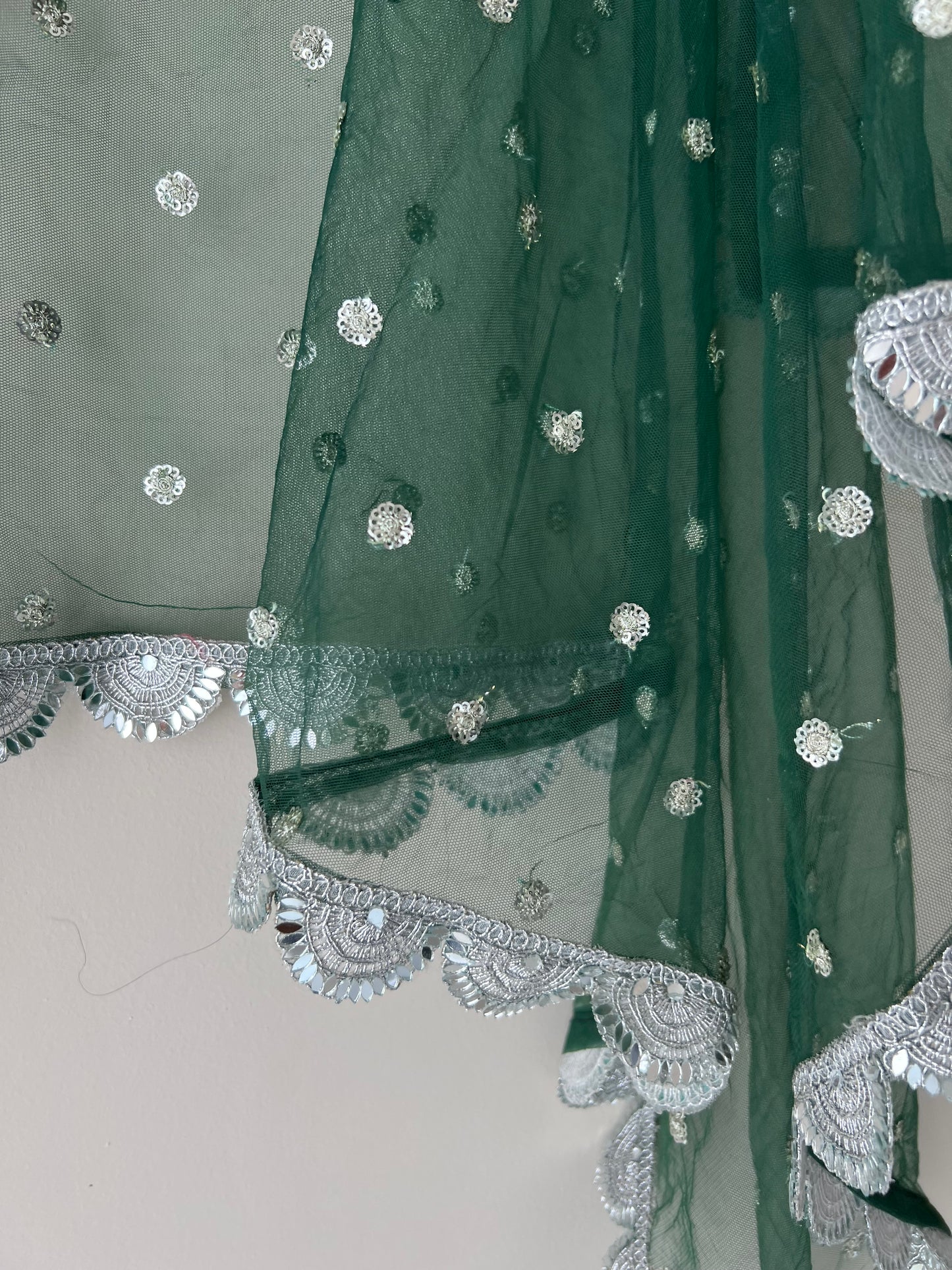 Green Net dupatta with scallop Silver border