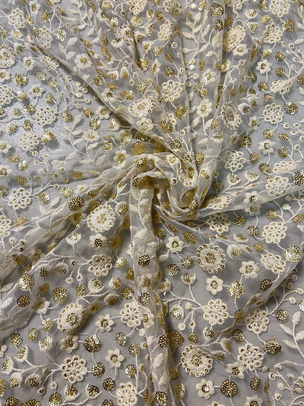 Dyeable net sequin flower embroidered fabric for lehengas, kurtas.