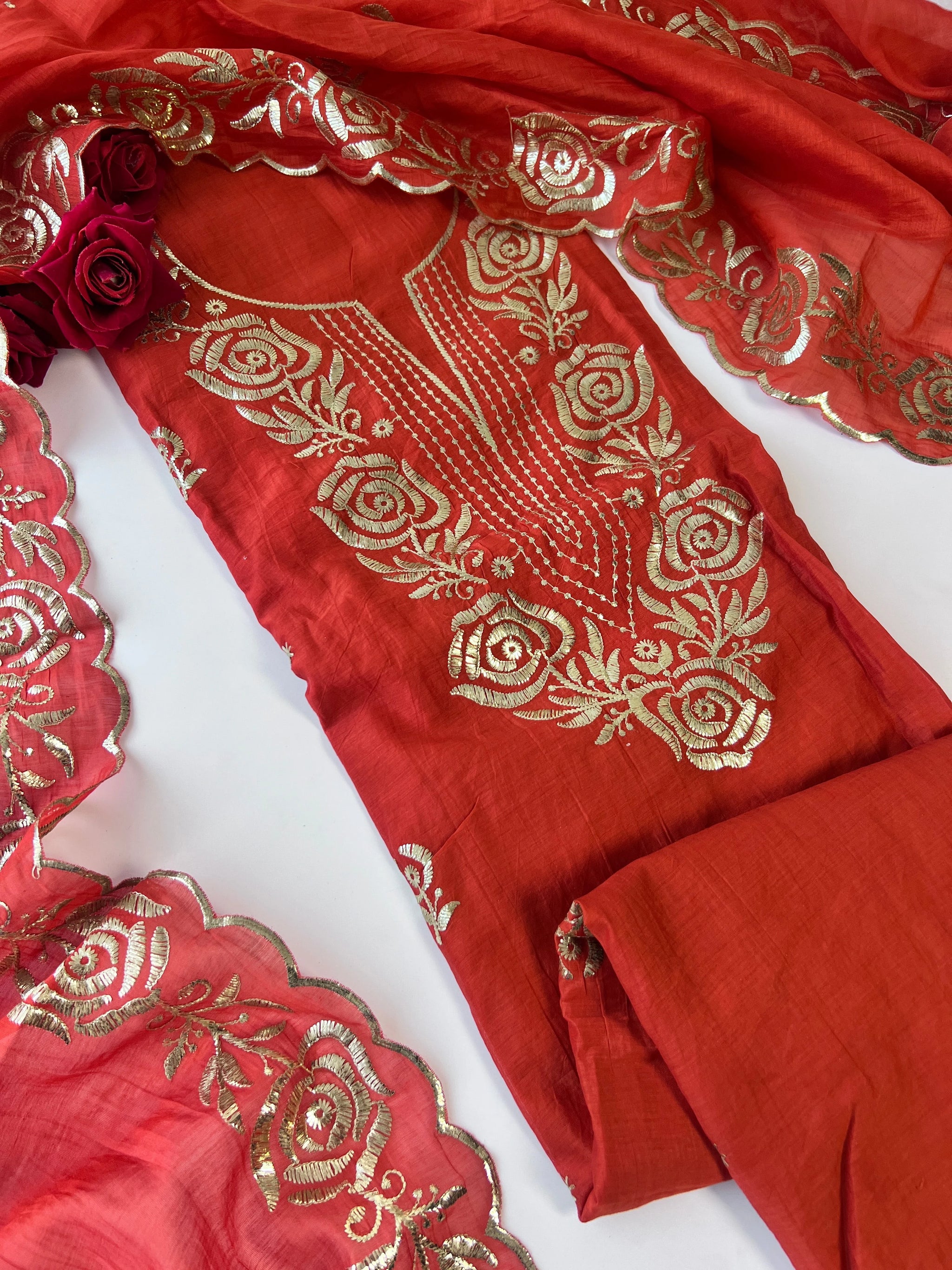 Orange Mul Chanderi dress material with pitta work