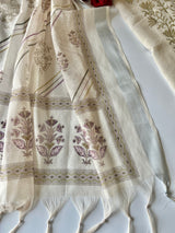 Women’s cream ethnic dress material with graceful all over prints and refined mul linen texture