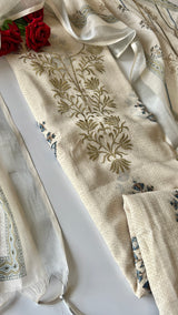 Designer mul linen suit material in light cream shade with sophisticated pitta embroidery work