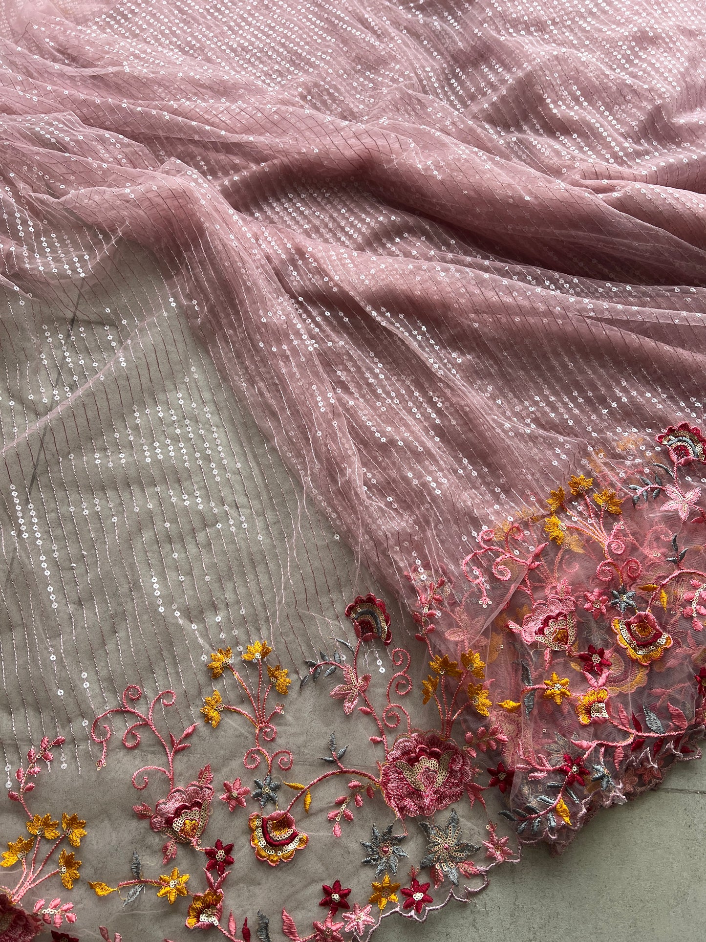 Net embroidered fabric for lehengas, kurtas.