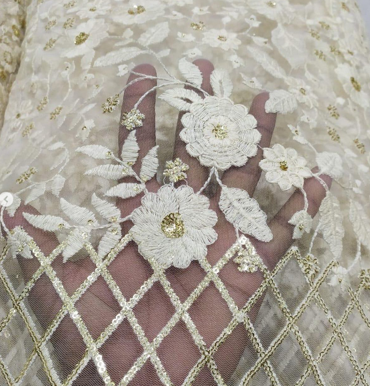 Dyeable net embroidered fabric for lehengas, kurtas.
