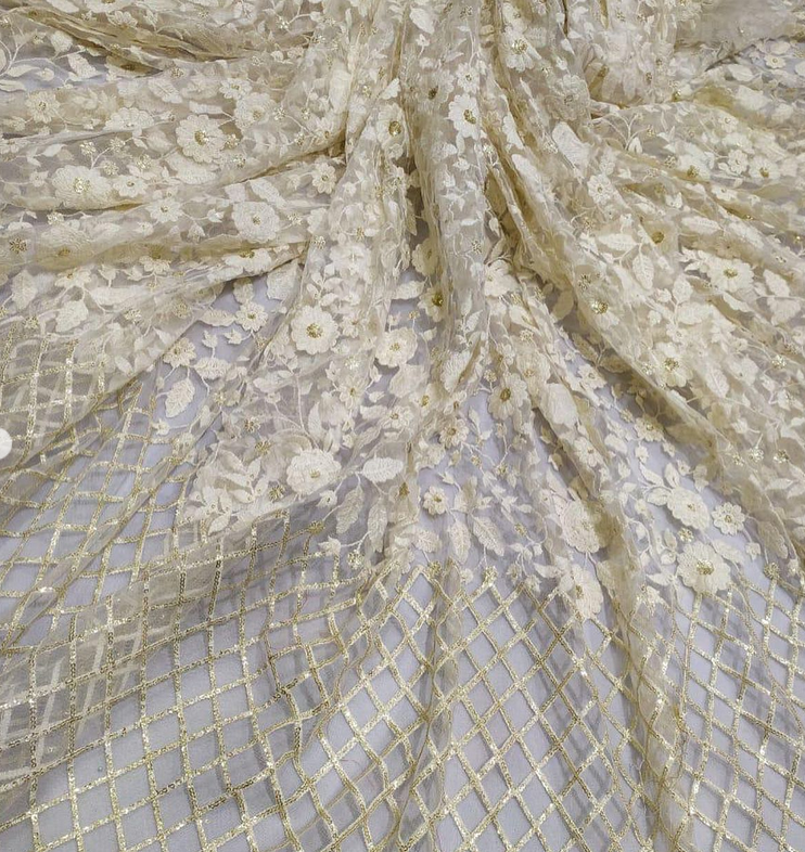 Dyeable net embroidered fabric for lehengas, kurtas.