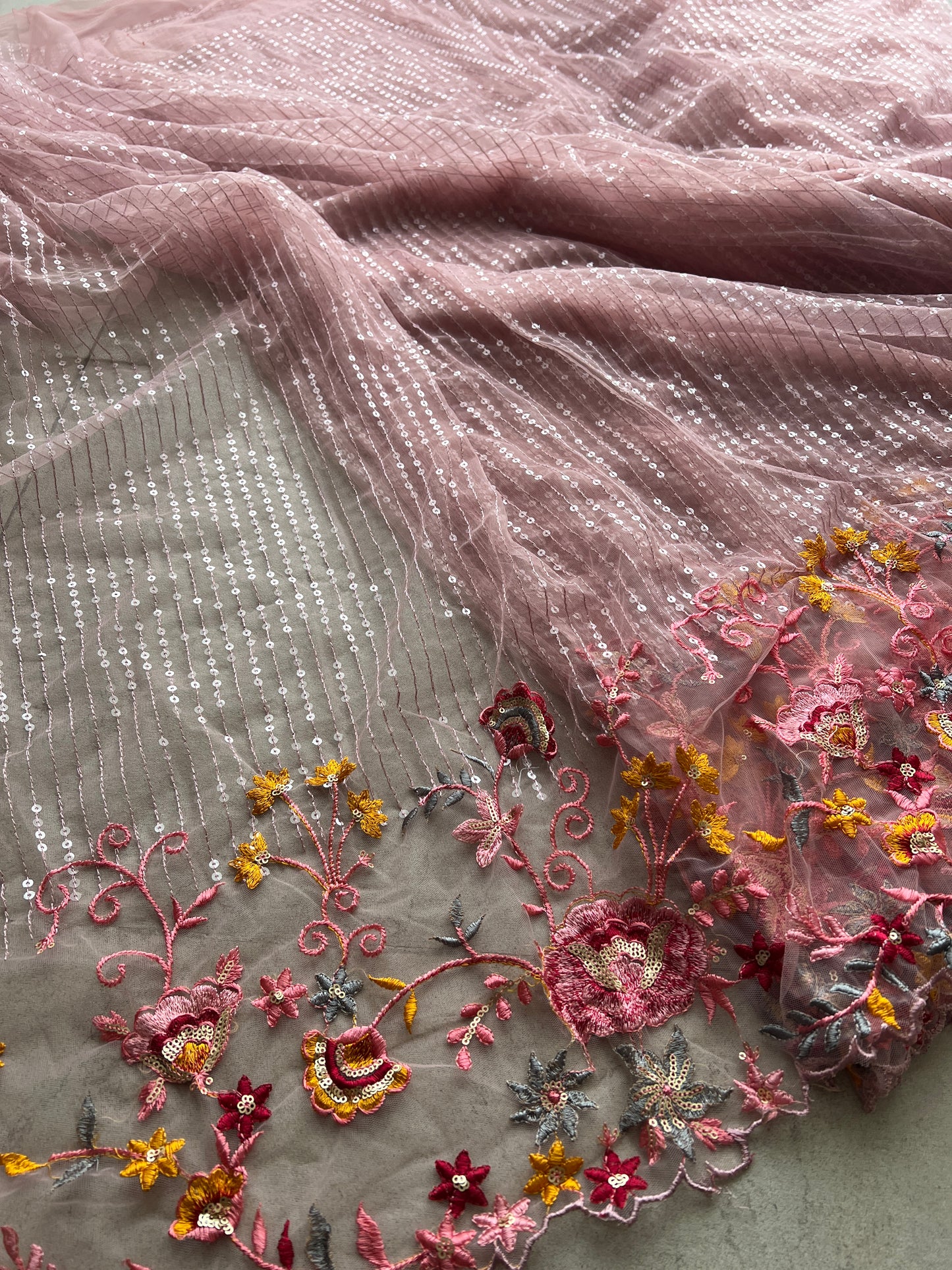 Net embroidered fabric for lehengas, kurtas.