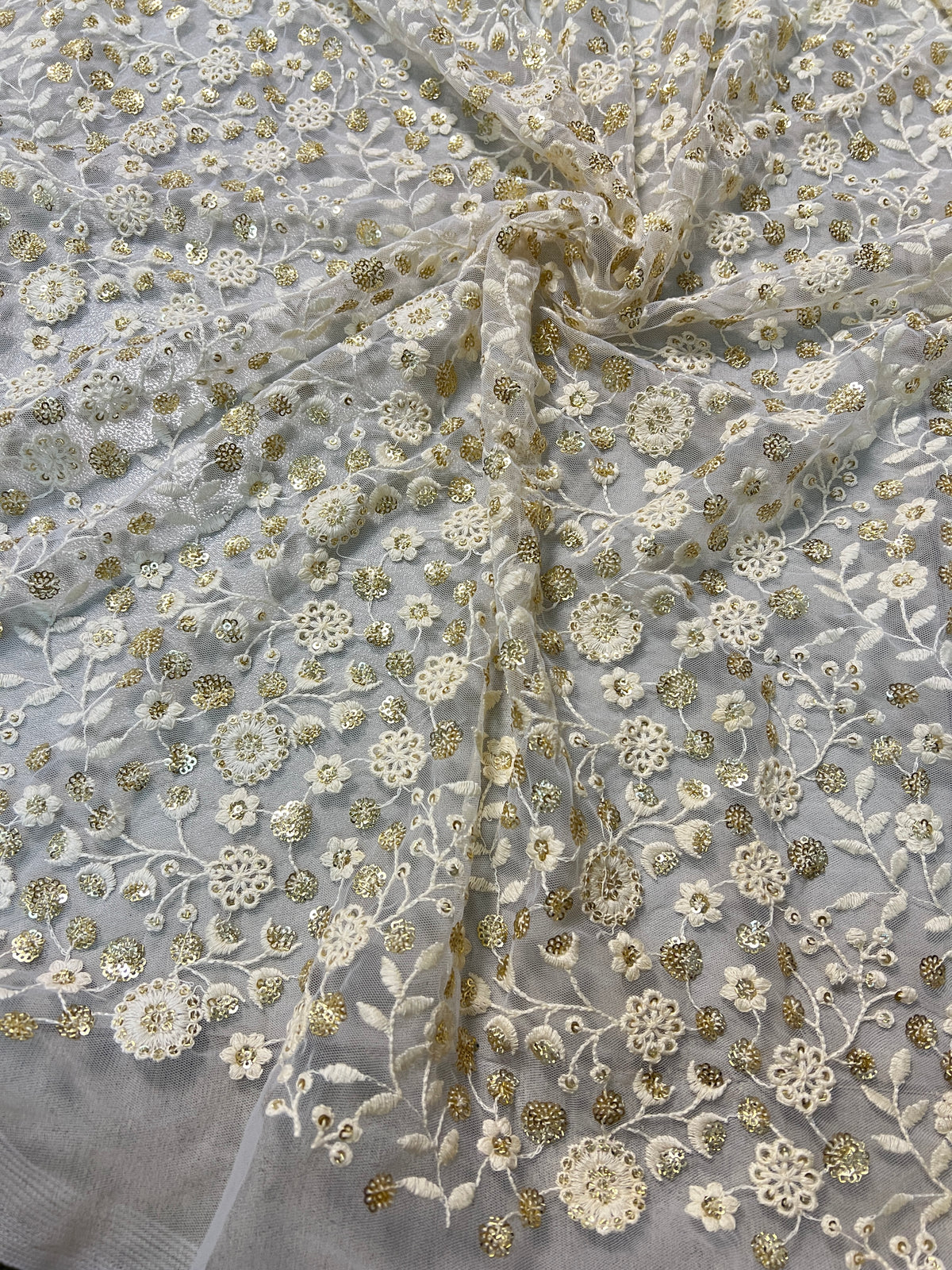 Dyeable net sequin flower embroidered fabric for lehengas, kurtas.