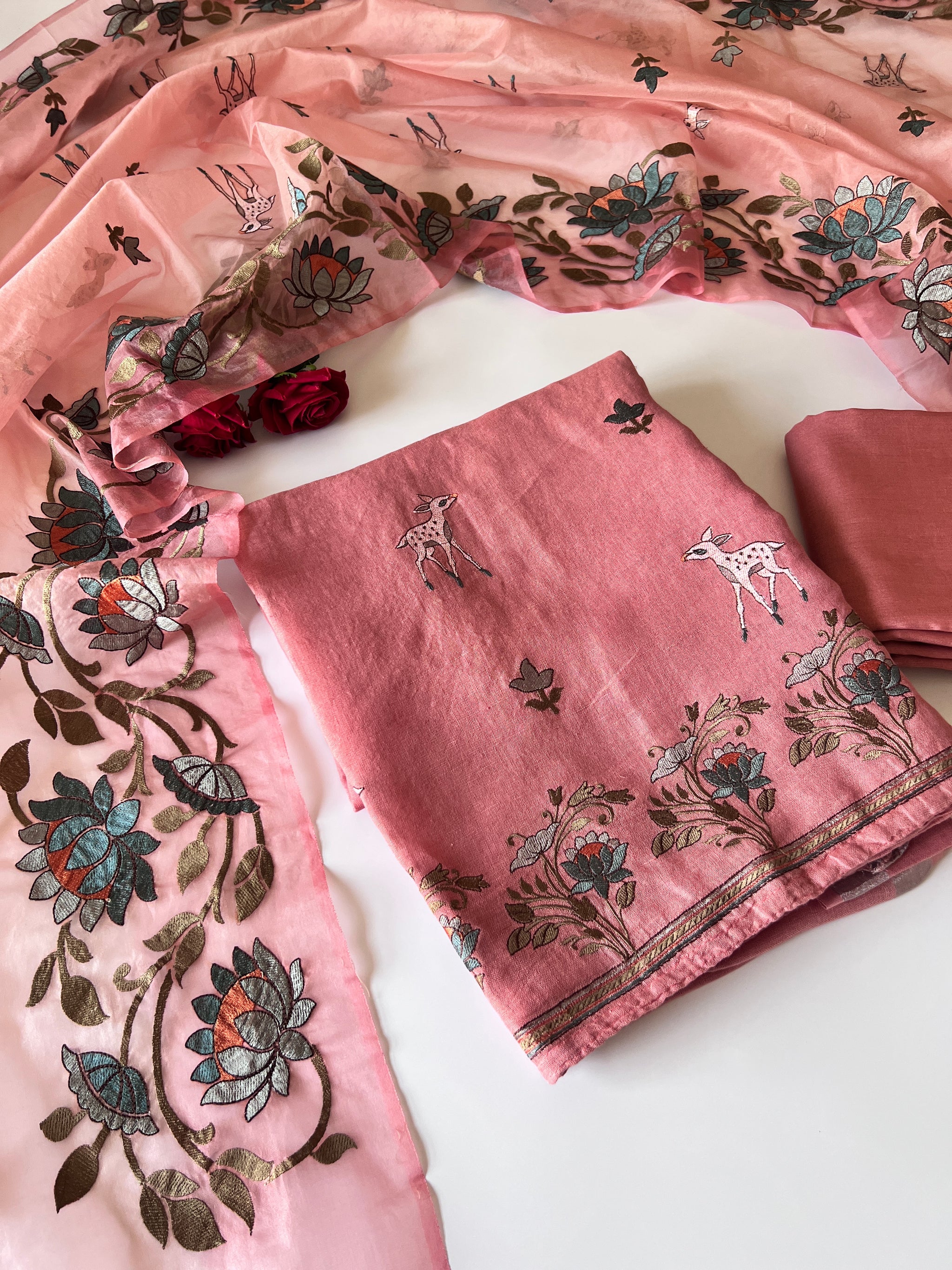 Pure linen Shikargah embroidered unstitched suit.