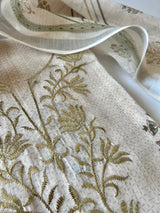 Elegant cream salwar suit set with lightweight mul linen fabric and delicate handcrafted pitta work
